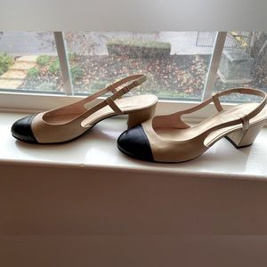 Leather black and tan baton heels by french sole.  Size 9.